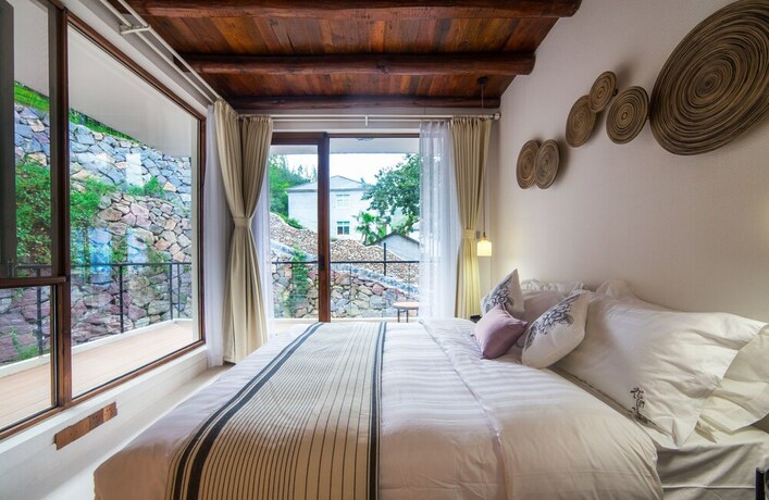 Imagen de la habitación del Hotel Qiansu Moganshan Huajianji Guesthouse. Foto 33