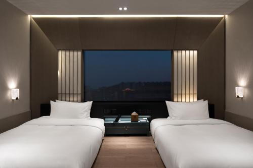 Imagen general del Hotel Qianzitong First Seeing. Foto 4
