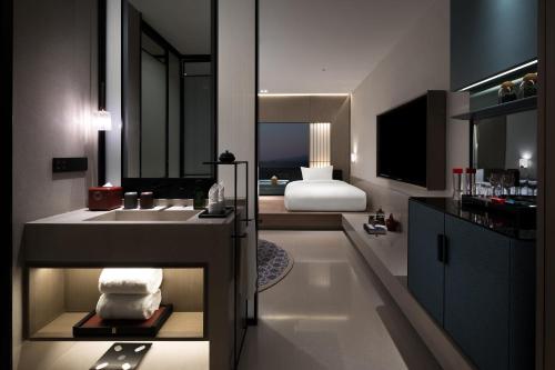 Imagen de la habitación del Hotel Qianzitong First Seeing. Foto 14