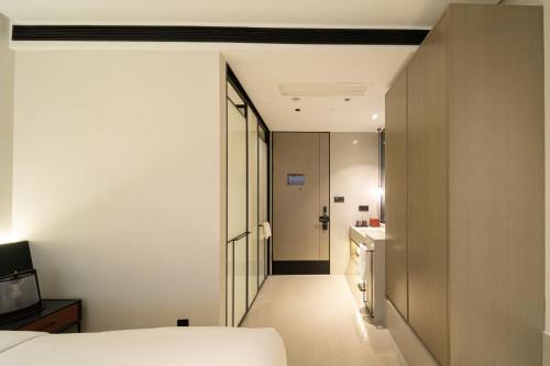 Imagen general del Hotel Qianzitong First Seeing. Foto 8