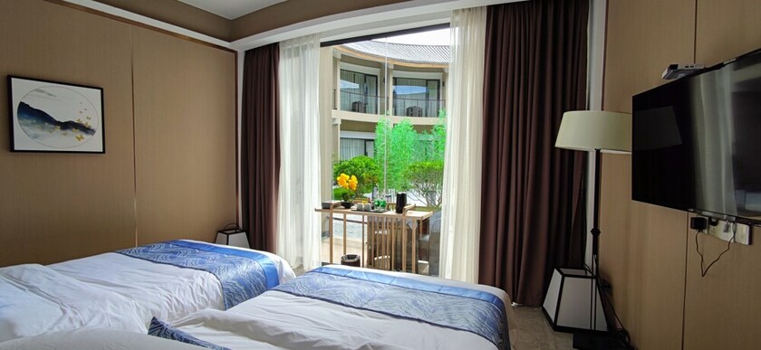 Imagen de la habitación del Hotel Qiaofeng Xingzilin. Foto 17