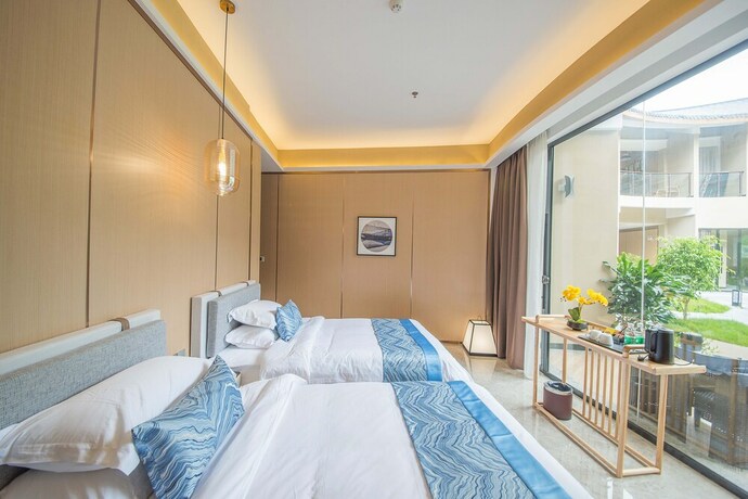 Imagen de la habitación del Hotel Qiaofeng Xingzilin. Foto 23