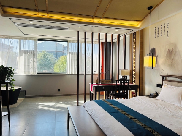 Imagen de la habitación del Hotel Qichi Waterfront BandB. Foto 2