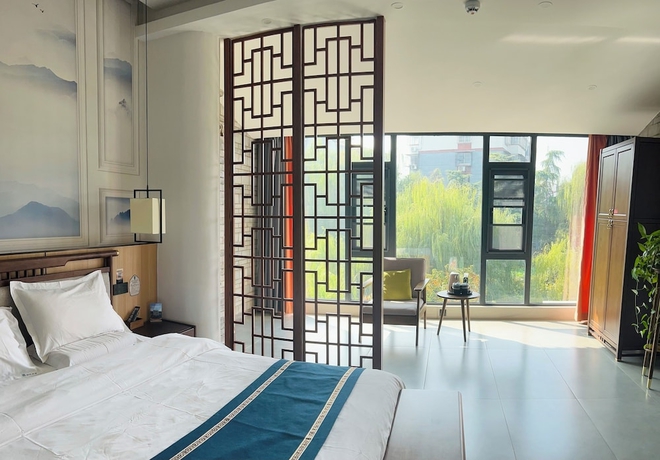 Imagen de la habitación del Hotel Qichi Waterfront BandB. Foto 6