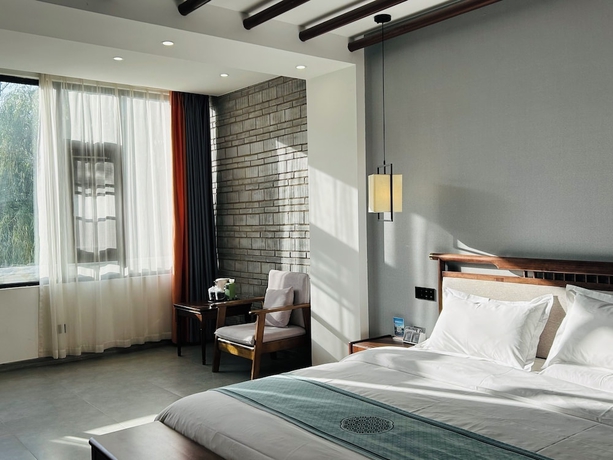 Imagen de la habitación del Hotel Qichi Waterfront BandB. Foto 7