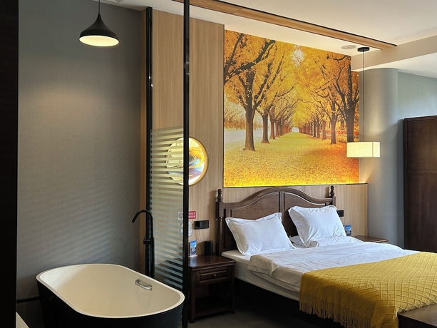 Imagen de la habitación del Hotel Qichi Waterfront BandB. Foto 8
