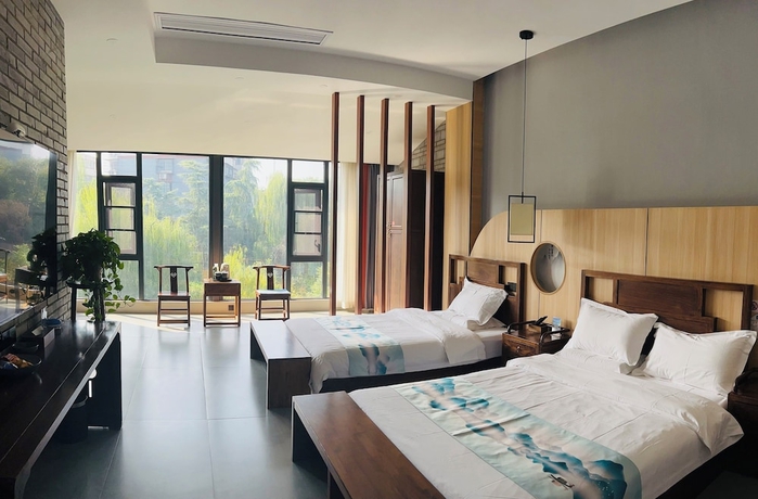 Imagen de la habitación del Hotel Qichi Waterfront BandB. Foto 13
