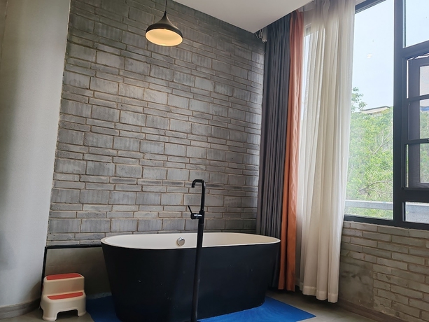 Imagen de la habitación del Hotel Qichi Waterfront BandB. Foto 15