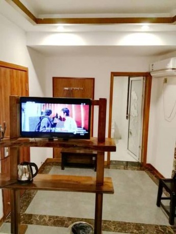 Imagen de la habitación del Hotel Qijiayi Theme Hostel No.2 Shop. Foto 7