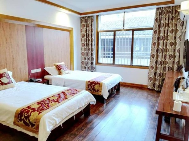 Imagen de la habitación del Hotel Qijiayi Theme Hostel No.2 Shop. Foto 9
