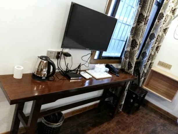 Imagen de la habitación del Hotel Qijiayi Theme Hostel No.2 Shop. Foto 10