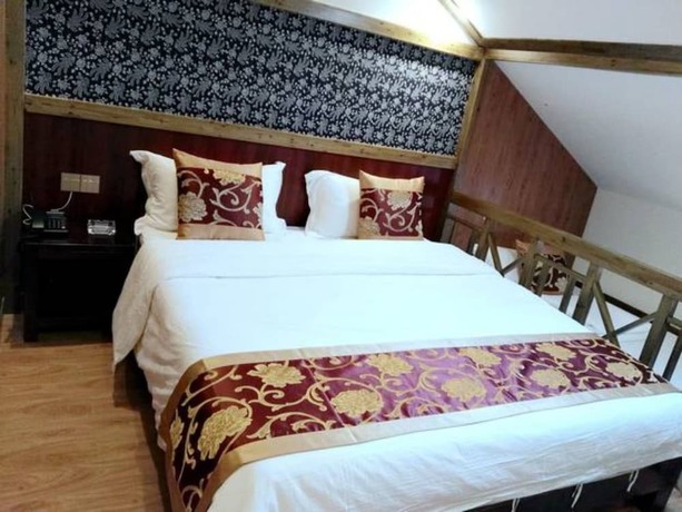 Imagen de la habitación del Hotel Qijiayi Theme Hostel No.2 Shop. Foto 11