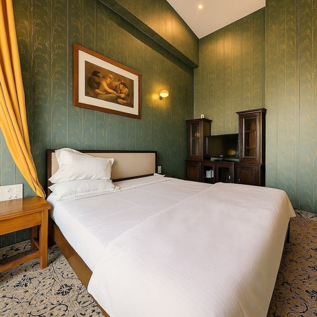 Imagen de la habitación del Hotel Qila. Foto 12