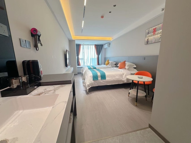 Imagen de la habitación del Hotel Qin Mengli. Foto 8