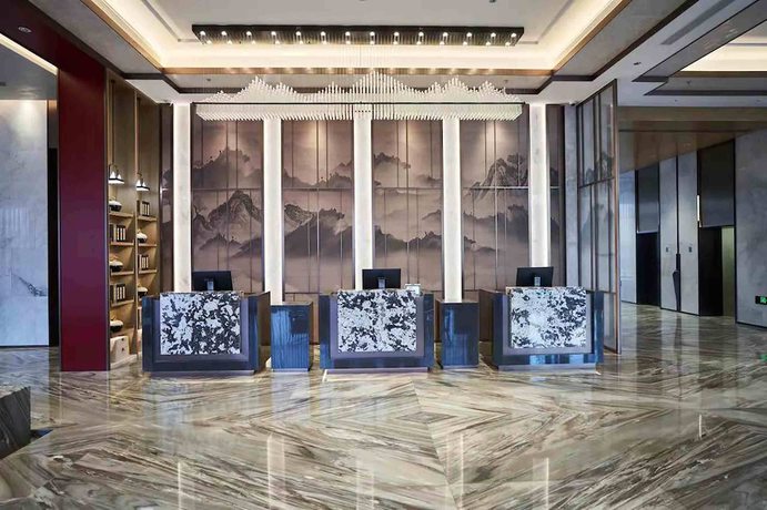 Imagen de los interiores del Hotel Qing Dao Bu Ke Bu Zhu. Foto 16
