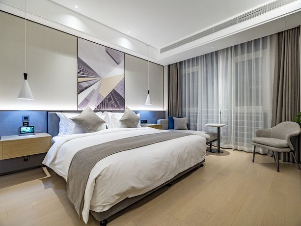 Imagen de la habitación del Hotel Qing Dao Bu Ke Bu Zhu. Foto 14