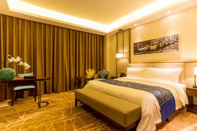 Imagen de la habitación del Hotel Qing Feng Garden Hotel. Foto 6