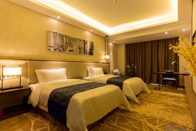 Imagen de la habitación del Hotel Qing Feng Garden Hotel. Foto 9