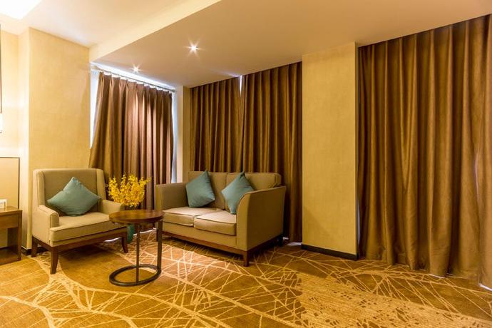 Imagen de la habitación del Hotel Qing Feng Garden Hotel. Foto 11