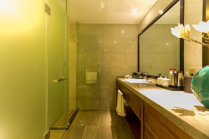 Imagen de la habitación del Hotel Qing Feng Garden Hotel. Foto 12