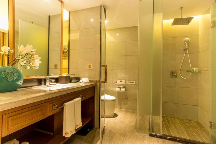 Imagen de la habitación del Hotel Qing Feng Garden Hotel. Foto 13