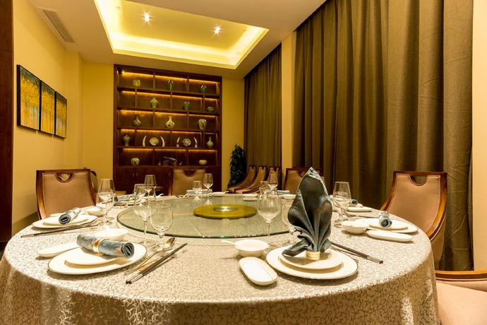 Imagen del bar/restaurante del Hotel Qing Feng Garden Hotel. Foto 5