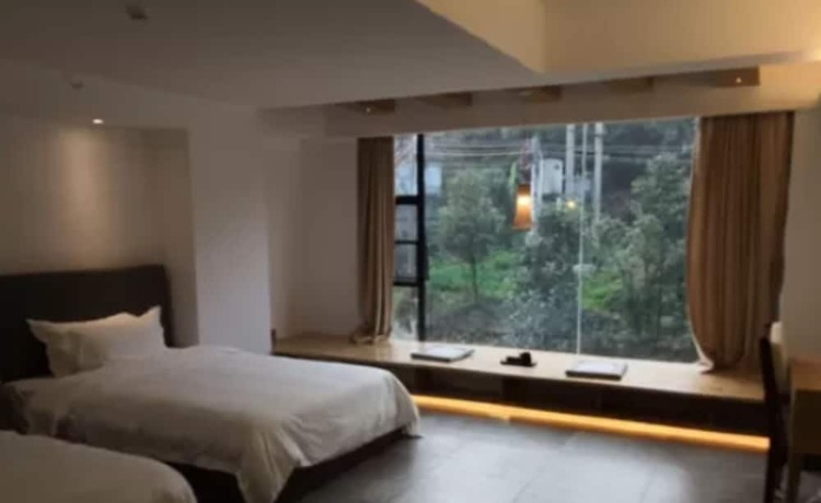 Imagen de la habitación del Hotel Qing Gu Ju. Foto 6