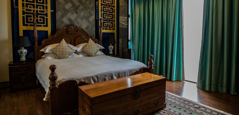 Imagen de la habitación del Hotel Qing Pu Villa. Foto 12