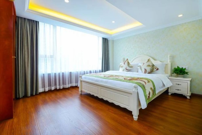 Imagen de la habitación del Hotel Qing Ya Apartment Chongqing. Foto 2