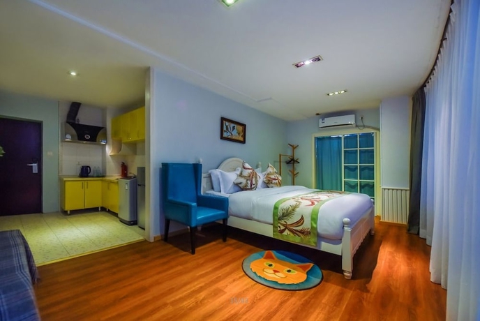 Imagen de la habitación del Hotel Qing Ya Apartment Chongqing. Foto 5