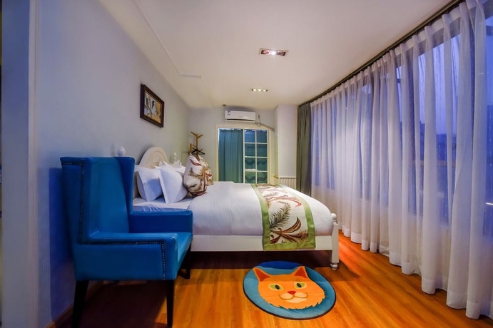 Imagen de la habitación del Hotel Qing Ya Apartment Chongqing. Foto 6