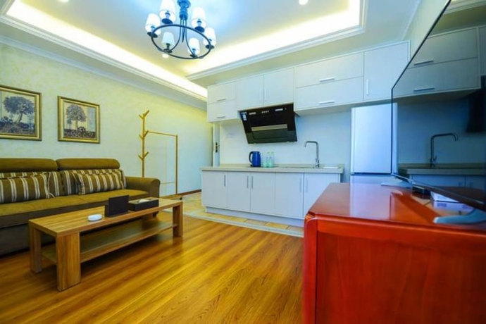 Imagen de la habitación del Hotel Qing Ya Apartment Chongqing. Foto 8