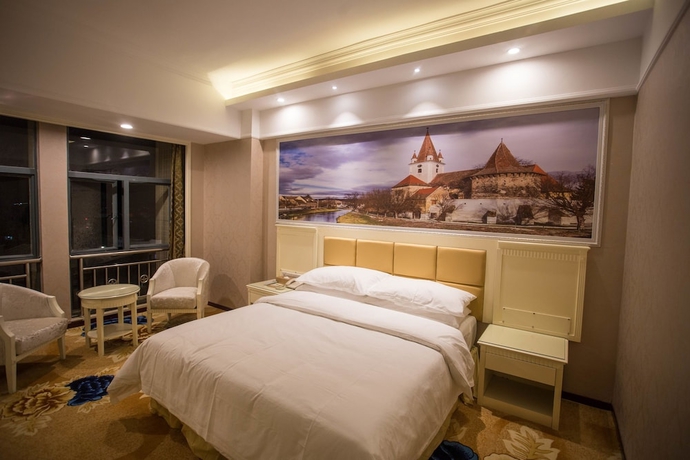 Imagen de la habitación del Hotel Qing Yuan Vienna - Yang Shan Branch. Foto 5