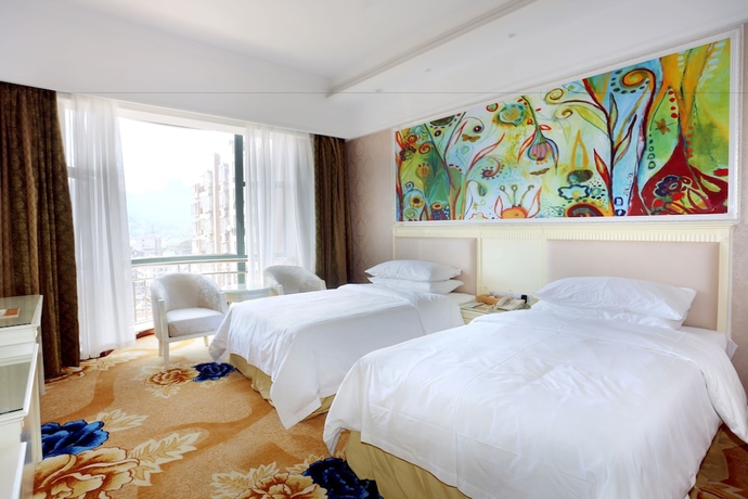 Imagen de la habitación del Hotel Qing Yuan Vienna - Yang Shan Branch. Foto 6