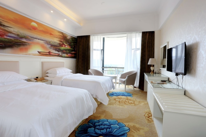 Imagen de la habitación del Hotel Qing Yuan Vienna - Yang Shan Branch. Foto 7