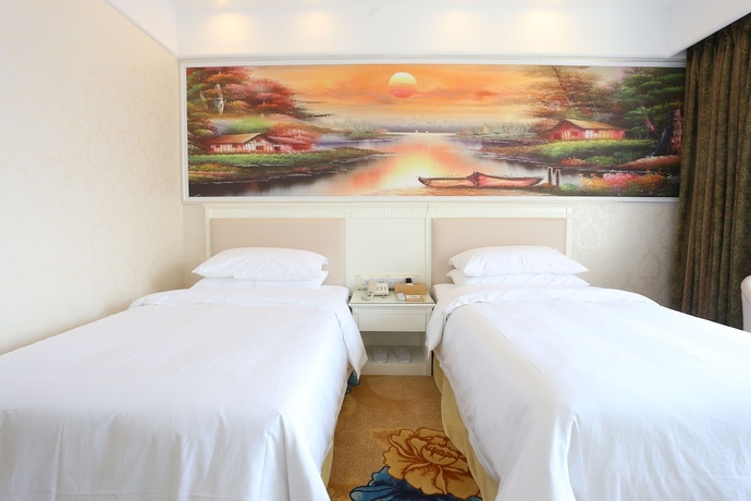 Imagen de la habitación del Hotel Qing Yuan Vienna - Yang Shan Branch. Foto 8