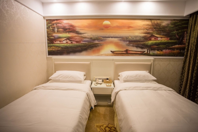 Imagen de la habitación del Hotel Qing Yuan Vienna - Yang Shan Branch. Foto 9