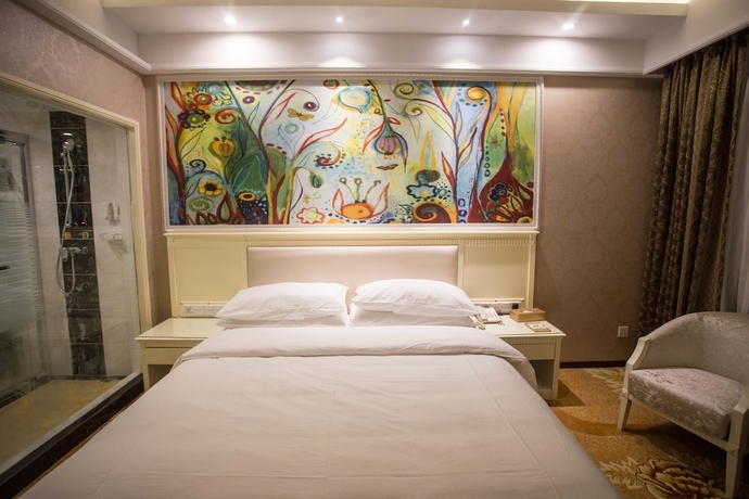 Imagen de la habitación del Hotel Qing Yuan Vienna - Yang Shan Branch. Foto 12
