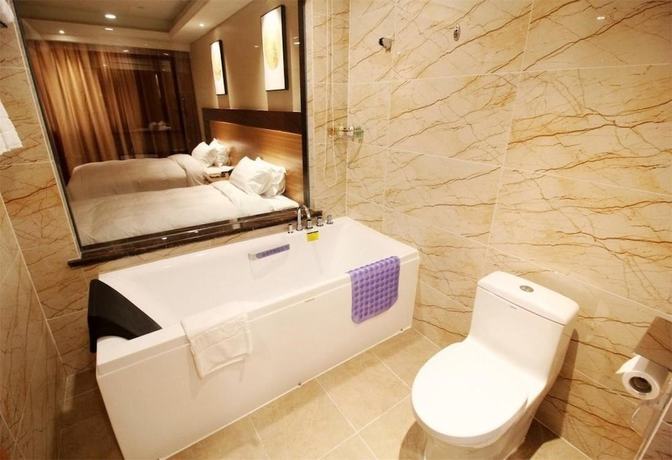 Imagen de la habitación del Hotel Qingdao Airport Fuhua. Foto 2