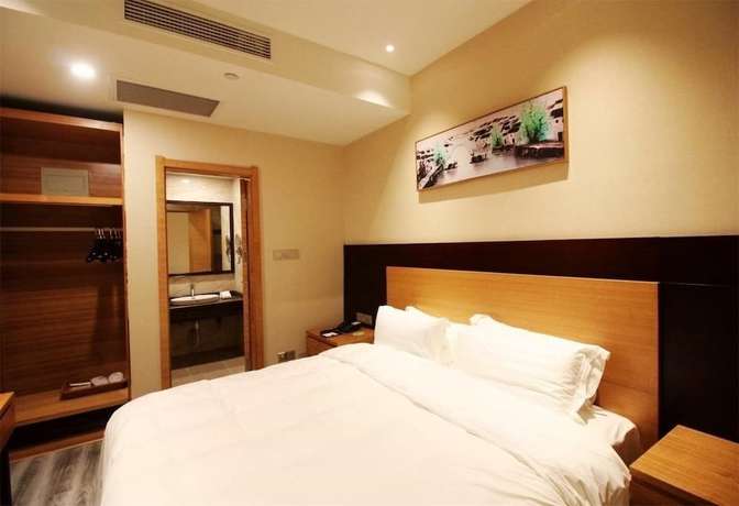 Imagen de la habitación del Hotel Qingdao Airport Fuhua. Foto 3