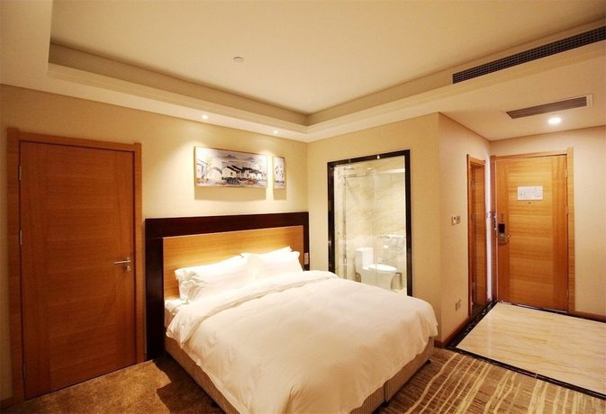 Imagen de la habitación del Hotel Qingdao Airport Fuhua. Foto 4