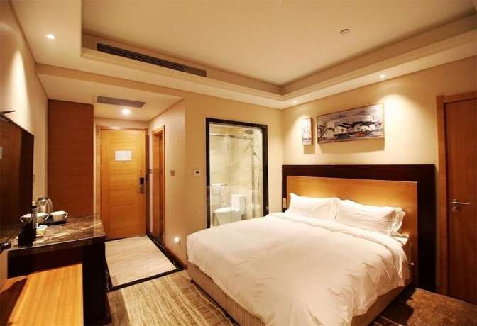Imagen de la habitación del Hotel Qingdao Airport Fuhua. Foto 8