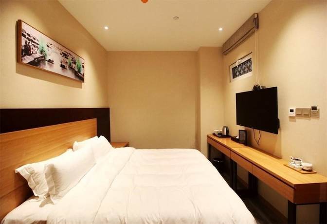 Imagen de la habitación del Hotel Qingdao Airport Fuhua. Foto 9