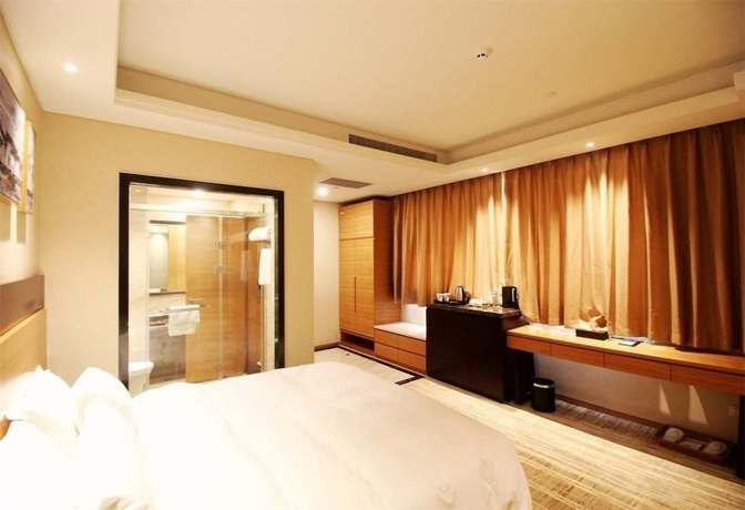 Imagen de la habitación del Hotel Qingdao Airport Fuhua. Foto 10