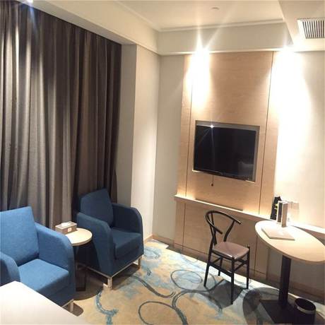 Imagen de la habitación del Hotel Qingdao Airport Fuhua. Foto 11