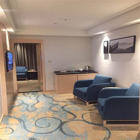 Imagen de la habitación del Hotel Qingdao Airport Fuhua. Foto 12