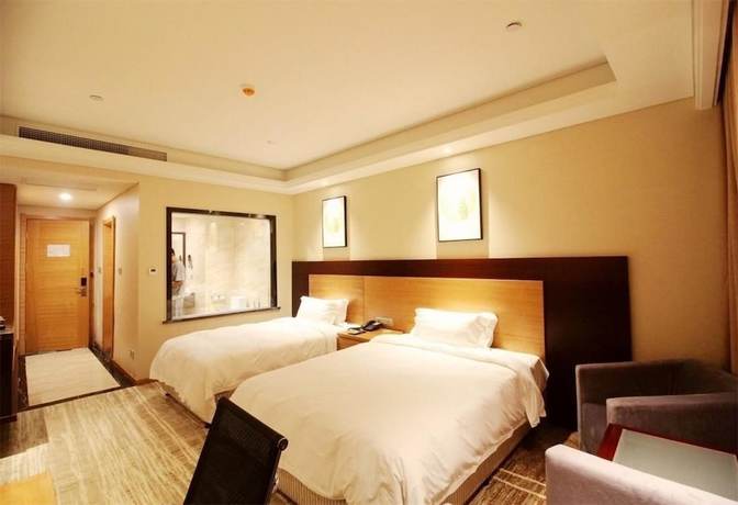 Imagen de la habitación del Hotel Qingdao Airport Fuhua. Foto 13