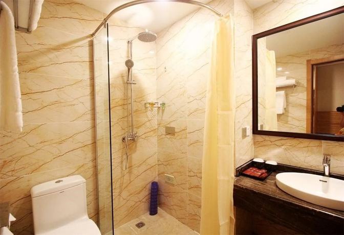 Imagen de la habitación del Hotel Qingdao Airport Fuhua. Foto 14