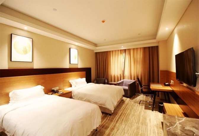 Imagen de la habitación del Hotel Qingdao Airport Fuhua. Foto 16