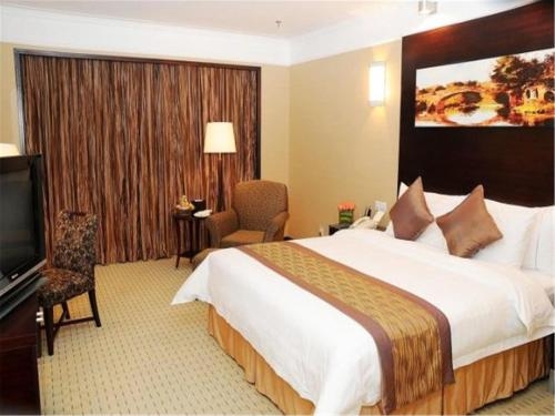 Imagen de la habitación del Hotel Qingdao Blue Horizon - Laoshan. Foto 6